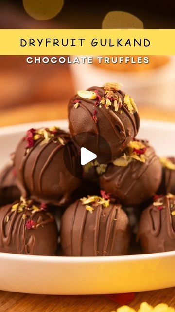 Neelam Agarwal | Vegetarian Food & Recipes on Instagram: "Festivities are upon us! ✨ . This Rakhi, instead of settling for store-bought sweets, I decided to create something special🌸 . Try these super easy yet delicious Dryfruit Gulkand Chocolate Truffles🍫 . Perfect for adding a homemade touch to your celebrations! 🎉✨ . Here’s the recipe-  Coconut - 3/4th cup (desiccated) Almonds - 1/2 cup (grind it coarsely) Cashews - 1/2 cup (grind it coarsely) Ghee - 1 tbsp Gulkand - 2 tbsp Condensed milk - 2 tbsp Saffron milk - 2 to 3 tbsp (infuse saffron in milk) Cardamom powder - 1/4th tsp Chocolate - 1 cup (melted, I have used @vanhoutenprofessionalindia)  Instructions -   In a pan, heat ghee and add desiccated Coconut and dry fruits. Toast it for 5 to 6 mins and transfer it to a bowl.  Add remai Diy Sweets, Rakhi Diy, Saffron Milk, Truffles Chocolate, Desiccated Coconut, Chocolate Fruit, Cardamom Powder, Dry Fruits, Indian Sweets