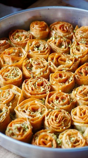 Antoniou Fillo Pastry on Instagram: "PISTACHIO BAKLAVA ROSES. These beautiful Pistachio baklava roses are a great version of Baklava to make for World Baklava Day this Sunday 17th November. They’re also a delicious dessert for celebrations during the festive season. They’re so easy to make and almost too pretty to eat!   Comment ROSES and we will send you the recipe.   Alternatively, here is the link which you can copy into your internet browser:  https://antonioufillo.com.au/blog/recipes/pistachio-baklava-roses   Video and recipe: @marys_kouzina for @antonioufillopastry   #baklava #baklavaroses #pistachio #pistachionuts #pistachiobaklava" Baklava Roses, Turkish Pistachio Baklava Recipe, Baklava Aesthetic, Baklava Pistachio, Roses Video, European Desserts, Pistachio Baklava, Pistachio Recipes, Baklava Recipe