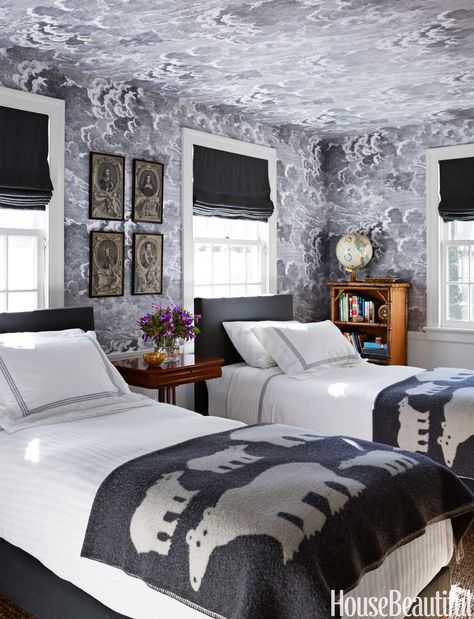 "We started with Fornasetti's Nuvolette wallpaper in a son's room, and that took us in this moody direction," Gorrivan says. Matouk linens on Savoir beds. Maura McEvoy  - HouseBeautiful.com 1920s House, Wallpaper Ceiling, Iconic Wallpaper, Bold Wallpaper, Twin Beds, Inspirational Wallpapers, Cole And Son, Colonial House, Guest Rooms