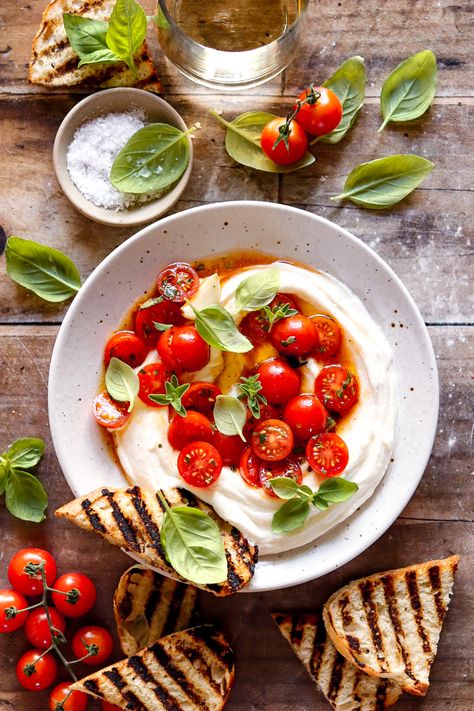 Juicy marinated tomatoes and spicy hot honey drizzled over creamy, fluffy whipped ricotta. Serve with crackers or grilled/toasted bread for a light and flavorful Memorial Day appetizer! Whipped Ricotta Honey, Ricotta Appetizer, Whipped Ricotta, Whipped Goat Cheese, Marinated Tomatoes, White Balsamic Vinegar, Toasted Bread, Easy Eat, Creamed Honey