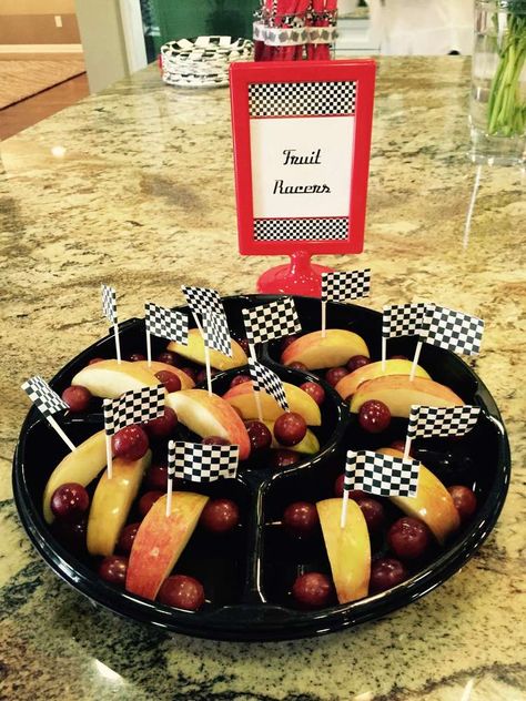 Dirt Bike Birthday Party Food Ideas, Race Car Birthday Party Treats, Dirt Track Racing Birthday Party Ideas, Race Car Fruit Tray, Food For Race Car Party, Two Year Old Race Car Birthday, Car Themed Treats, F1 Food Ideas, Four Year Old Race Car Birthday