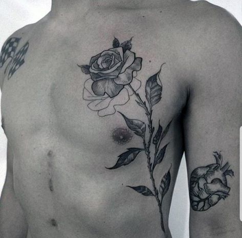 Men Chest Flower Tattoo, Rose Tattoo On Chest Men, Rose Tattoo Men Back, Chest Tattoo Men One Side, Rose Tattoo Men Ribs, Side Tattoos For Men Ribs Design, Rose On Chest Tattoo, Man Flower Tattoo, Flower Chest Tattoo Men