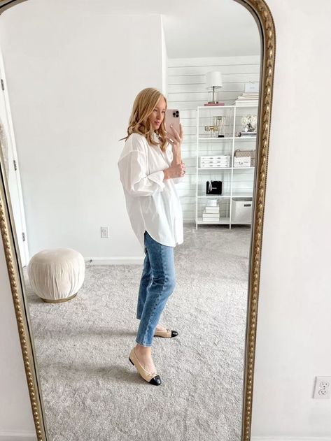 How To Style a White Button-Up for Summer. Effortless sophistication meets classic elegance with a stunning summer outfit featuring a white button-up top untucked, paired with sleek straight-leg jeans. This look effortlessly merges comfort and style, making it a great choice for a summer day. The fluidity of the untucked and oversized nature of the top beautifully contrasts with the structured straight-leg jeans, creating a balanced and flattering silhouette. Button Up Shirt With Jeans, Chanel Ballet Flats Outfit, Shoes For Moms, Black Flats Outfit, Chanel Shoes Outfit, Ballerina Flats Outfit, White Sweater Jacket, Chanel Ballerina Flats, 2023 Outfit Ideas