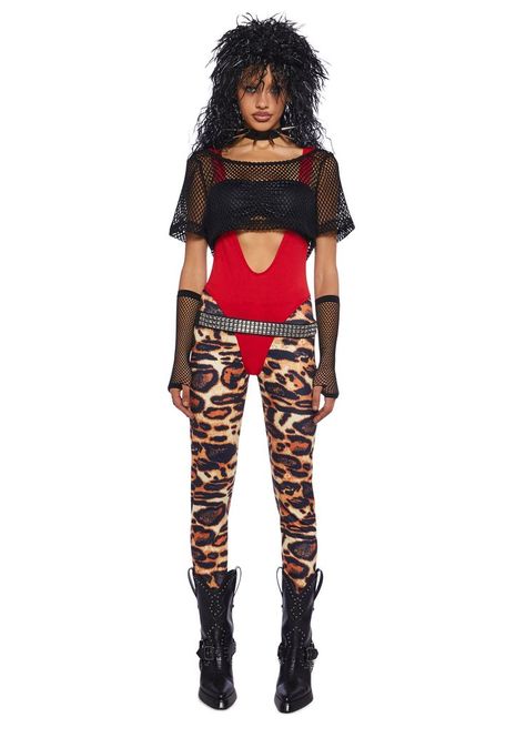 for going back to the '80s! This costume set has a stretchy jersey and sheer fishnet construction. Includes a cropped bandeau top, a short sleeve cropped tee, a unitard, leopard-printed leggings, a vegan leather belt, arm warmers, leg warmers, a spiked choker necklace, and a mullet wig.[Collection] Glam Rock Halloween Costume, Hair Band Costume 80's, Techno Halloween Costumes, Female Pimp Costume, Motley Crue Costume, Rock And Roll Theme Party Outfit, 80s Groupie Fashion, Rock Star Costume Women, Black Wig Halloween Costume