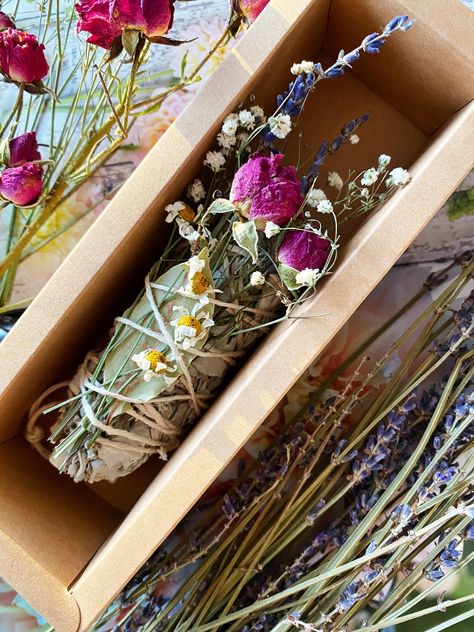 {Luck * Manifest * Abundance} Sacred Smoke Bundle. Made with ethically sourced and organically farmed White Sage, Hand dried Roses, Babies Breath, Lavender, Chamomile, Inscribed Bay Leaf and wrapped in organic hemp string. Charged during the 2/22/22 Portal. Approximately 6in in length. Sage Wands, Dried Roses, Drying Roses, Babies Breath, Manifest Abundance, Bay Leaf, Smudge Sticks, White Sage, Dry Hands