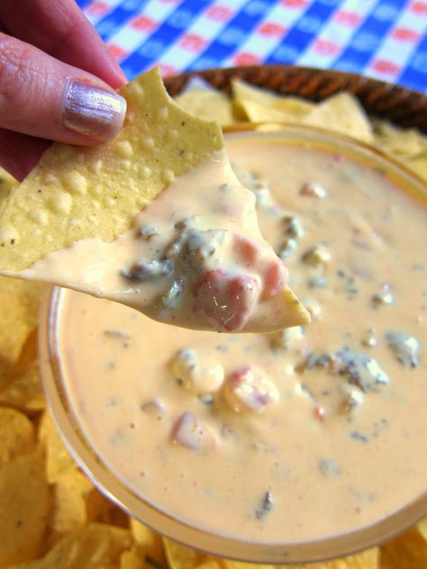 Creamy Rotel Dip - sausage, velveeta, cream cheese, sour cream and Rotel - this dip is amazing! It is always the first thing to go!! Everyone asks for the recipe!! Rotel Dip, Tortilla Chip, Queso Dip, Ooey Gooey, Football Food, Yummy Dips, Dip Recipe, Party Food Appetizers, Dip Recipes