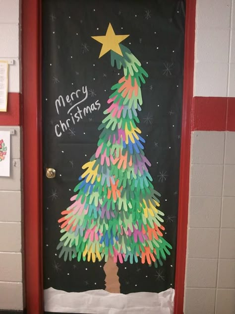 The Christmas door to my classroom (Art room) Had a few helping hands from the kids. Saw the idea on Pinterest, changed it up a little to make it mine :)  Facebook: WMP Purple Crayon Door Decorations Classroom Christmas, Classroom Christmas Decorations, Christmas Door Decorating Contest, Christmas Classroom Door, School Door Decorations, Door Decorating Contest, Christmas Door Decoration, Christmas Bulletin, Holiday Classroom