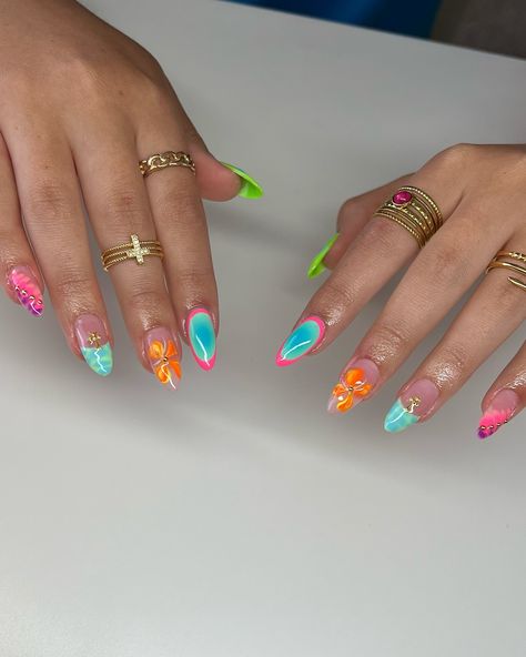 cruise ready 🌺🐬☀️ inspo: tiktok @shopagaloreco products used: *bonding base *rose glow base *aquamarine, plastic pink, olympic, tuscan sun, electric orange, cyan, ultra violet, ufo green *bling gel *diamond steel top coat use code ‘ALEXIA10’ at checkout 🤎 #nails #nailinspo #gelx #gelxinspo #summernails #summernails2024 #gelxnails #gelxnailtech #cltnails #cltnailtech #cruisenails #vacaynails Short Nail Designs Bright Colors, Miami Vice Nails, Over The Top Nails, Sun Nails Design, Aquamarine Nails, Cruise Nails, Electric Orange, Summery Nails, Vibrant Nails