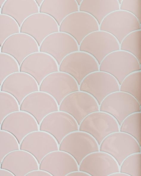 When our clients mentioned that they were open to pink tile in their bathroom, we nearly did cartwheels, thinking of what a fun design opportunity this project would be. It would also be a challenge, because we needed to channel ‘sophisticated pink’ so the bathroom felt modern and not too girly or even outdated. First Step: Incorporate The Pink We decided to limit the pink tile by adding a white tile wainscot with a modern stacked layout. We then selected a pink tile with the right color of... Tile Wainscot, Black Storage Cabinet, Pink Tile, Were Open, Pink Tiles, White Tiles, Wainscoting, Fun Design, The Bathroom