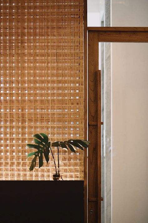 ZXC studio clads a coffee shop in jakarta with pivoting panels of rattan Rattan Screen, Glass Entrance, Bamboo Screen, Living Photography, Communal Table, Small Lanterns, Banquette Seating, Space Interiors, Solar Heating