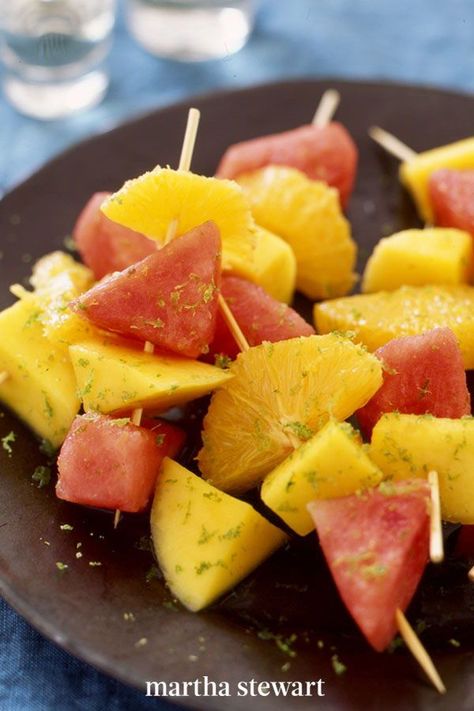 Try these skewers for a refreshing finale to a summer meal high. Cut the mango, oranges, and watermelon in the morning and refrigerate, then sprinkle on tequila an hour before eating. #marthastewart #recipes #recipeideas #drinkrecipes #drinkideas #fundrinkrecipes Tequila Soaked Watermelon, Alcohol Soaked Fruit, Infused Fruit, Watermelon Wedge, Fruit Skewers, Summer Meal, 5 De Mayo, Main Squeeze, Beautiful Fruits