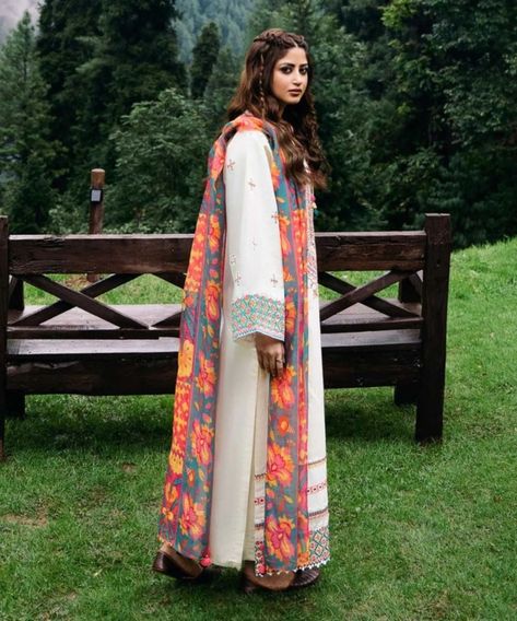 Collection - Sapphire Collection Rejoice in the winter chill with our ivory and multicoloured two-piece featuring a solid cambric shirt with embroidery and printed manar dupatta. Shirt: Dyed Embroidered Cambric Shirt Front Panels 3PC Dyed Cambric Shirt Back 1.15M Embroidered Sleeves Borders 4PC Dyed Embroidered Cambric Shirt Sleeves 0.66M Fabric: Cambric Colour: Ivory Dupatta: Printed Manar Dupatta 2.5M Fabric: Manar Colour: Multicolor Launching soon. Stay tuned for more updates Shirt With Embroidery, Fancy Suit, Embroidered Sleeves, Kids Fabric, Launching Soon, Women Shawl, Baby Wraps, In The Winter, Stay Tuned