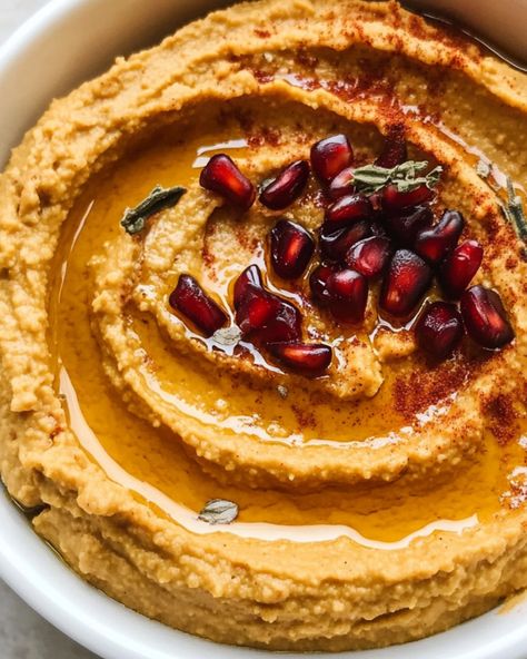 Celebrate the rich flavors of fall with creamy pumpkin spice hummus, a unique and delightful twist on the cherished traditional hummus. This recipe is perfect for cozy autumn gatherings, blending sweet and savory notes in a dish that is both healthy and deeply satisfying. Here, the addition of pumpkin puree and warming spices transforms ordinary... Pumpkin Spice Hummus, Traditional Hummus, Pumpkin Hummus Recipe, Carrot Spice Cake, Pumpkin Hummus, Speed Foods, Seasonal Treats, Best Pumpkin, Meal Suggestions