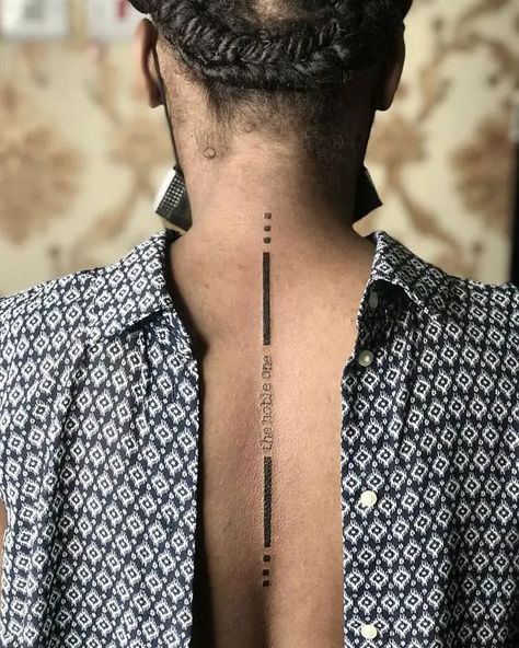 2024 Men's Spine Tattoos: 15 Unique Ideas and Designs - mens-club.online Tattoo Spine Mens, Men Spine Tattoo Ideas, Men Back Tattoos Spine, Back Tattoo Men Spine, Back Spine Tattoos Men, 2024 Tattoo Trends, Male Spine Tattoos, Spinal Tattoo For Men, Spine Tattoos Men