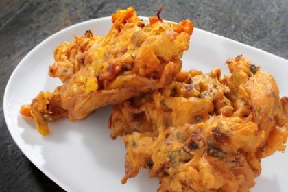 Baked onion bhajis - Netmums Onion Bhaji Recipes, Onion Bhajis, Cooking Terms, Onion Bhaji, Baked Onions, Pakora Recipe, Bhaji Recipe, Pakora Recipes, Indian Snacks