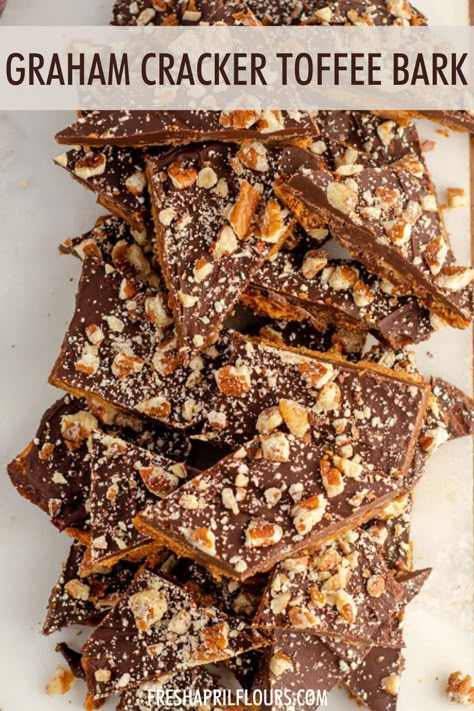 A twist on the classic toffee bark-- made with an easy butter and brown sugar toffee, this graham cracker toffee bark is a perfect sweet, salty, and sticky treat. Dress it up with festive sprinkles for holidays or other celebrations! via @frshaprilflours | easy graham cracker toffee bark recipes | toffee bark with graham crackers | christmas toffee bark | christmas bark easy cracker toffee | christmas toffee bark recipes Gram Cracker Toffee Bark, Caramel Graham Cracker Bark, Cowboy Bark Pioneer Woman, Easy Graham Cracker Toffee, Avalanche Bark Recipe, Christmas Goodie Trays, Graham Cracker Bark Christmas, Christmas Bark Graham Crackers, Graham Cracker Toffee Bark