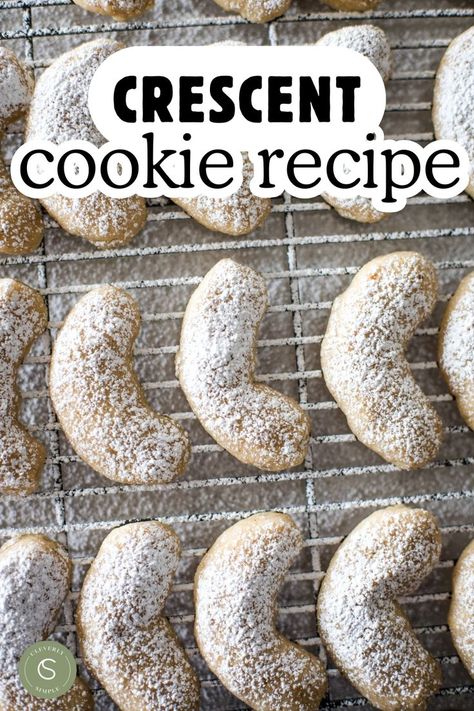 crescent cookies dusted with powdered sugar on cooling rack Nut Crescent Cookies, Walnut Cookies Christmas, Walnut Crescent Cookies, Crescent Cookies Recipes, Walnut Crescent Cookies Recipe, Nut Roll Cookies, Almond Crescent Cookies Recipes, Pecan Crescent Cookies, Nutty Cookies