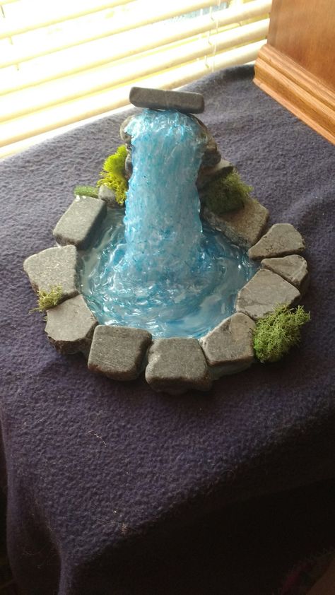 This was made after watching Tenshi*'s Hot Glue Waterfall Tutorial on YouTube. It took quite a few of the long glue sticks, and I used the slate rocks that are available at Walmart. Fairy Garden Waterfall, Hot Glue Waterfall, Waterfall Tutorial, Waterfall Pond, Fairy Village, Garden Waterfall, Fairy Furniture, Faeries Gardens, Urban Street Art