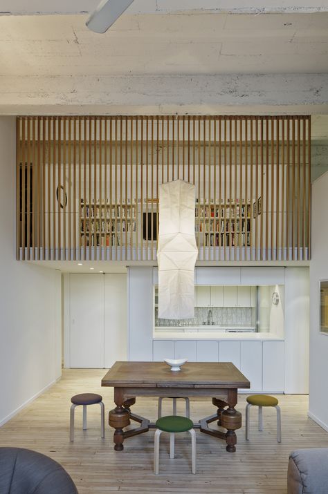 Jennifer Hanlin Cobble Hill Apartment Entryway, Photo by Eduard Hueber Japanese Loft Apartment, Apartment Living Room Inspiration, Japanese Loft, Japanese Storage, Storage Chests, Apartment Entryway, Stairs In Living Room, Apartment Storage, Apartment Dining