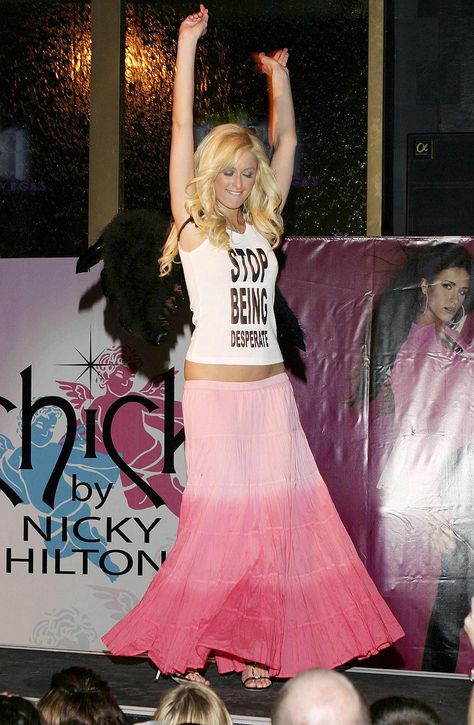 Paris Hilton Says Her 'Stop Being Poor' Shirt Was Photoshopped: 'Don't Believe Everything You Read' Paris Hilton 2000s Fashion, Stop Being Desperate, Y2k Costume, Paris Hilton Outfits, Paris Hilton 2000s, Iconic 2000s, Paris Hilton And Nicole Richie, Y2k Graphic Tees, Hallowen Costume