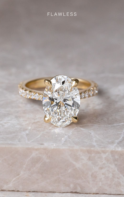 The four claw is a simple but elegant setting, add to that the timeless beauty of a diamond set band and you have this captivating ring that gives us all the feels 🥰🫶  Is this your forever ring? 💍🤍  Florian Setting 2.90ct Center Stone Oval Cut Diamond Band 18k Recycled Gold  #engagementring #diamondring #diamondband #ovalcut #yellowgold #engagementideas #elegantrings #ovaldiamond #engaged Gold Oval Wedding Ring Set, Oval Engagement Ring Pave Band, Pave Oval Engagement Ring, Yellow Gold Pave Engagement Ring, Gold Pave Engagement Ring, Claw Engagement Ring, Pave Engagement Rings, Gold Oval Engagement Ring, Sparkling Engagement Rings