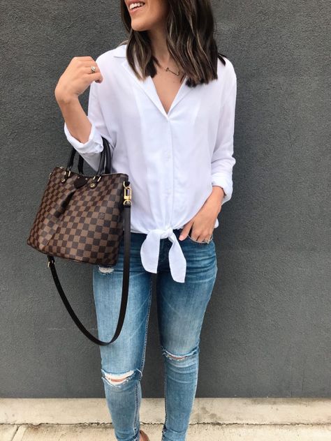 White tie top, jeans, & Louis Vuitton bag | Classic denim jeans look Odeon Pm Louis Vuitton Outfit, Best Louis Vuitton Handbags, Louis Vuitton Uk, Louis Vuitton Siena, White Tie Top, Louis Vuitton Handbags Neverfull, Louis Vuitton Bag Outfit, Vuitton Outfit, Louis Vuitton Outfit