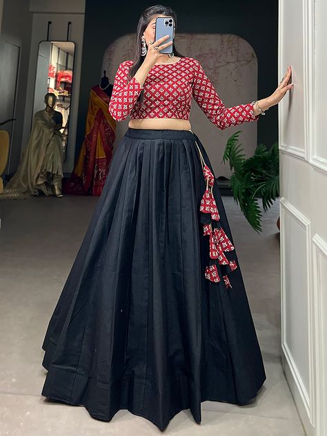 Upgrade your traditional wardrobe with this wonderful black cotton navratri lehenga with a printed crop top from Ethnic Plus. Crafted from high-quality cotton material, this set features a black color plain lehenga and a maroon crop top with digital printed work.
The black lehenga is fully stitched up to 42 inches, offering a comfortable fit for various body types. With a 3.40-meter flair and a 41-inch length, it showcases elegance and grace. The crop top, also stitched to perfection, fits up to Crop Top Lehenga From Silk Saree, Black Skirt And Top Indian, Crop Top Outfits Skirt, Black Blouse Navratri Outfit, Crop Tops For Sarees, Crop Tops Outfits Traditional, Unique Navratri Outfits Ideas, Plain Skirt And Crop Top Indian, Black Choli Designs