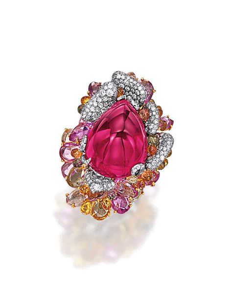 RUBELLITE, MULTI-COLOURED SAPPHIRES AND DIAMOND RING. Centring on a pear-shaped cabochon rubellite weighing 45.45 carats, to a stylised mount set with fancy-shaped rose-cut and faceted coloured briolette sapphires of pink, yellow & green hue, decorated by brilliant-cut diamonds, coloured sapphires and diamonds together weighing 28.40 & 3.00 carats respectively, mounted in 18 karat white & blackened gold. Tourmaline Jewelry, Diamond Brooch, Fabulous Jewelry, Floral Jewellery, Lovely Jewellery, Stunning Jewellery, Yellow Diamond, Flower Jewellery, High Jewelry