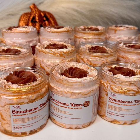 Immerse yourself in the aromatic delight of Cinnabonne Kisses, the ultimate indulgence for your skin this season🍁🎃. Inspired by the warmth and comfort of freshly baked cinnamon rolls, this body butter envelops you in a rich, creamy scent that is both nostalgic and seductive. With every application, your senses are greeted by the perfect blend of warmth and sweetness🤍❤️. This scent would also have its own body oil and body scrub Beyond the scent, Cinnabonne Kisses is formulated with the fi... Pecan Butter, Cherry Coconut, Maple Brown, Whipped Butter, Pumpkin Waffles, Fall Fragrance, Body Butters, Toasted Marshmallow, Whipped Body Butter