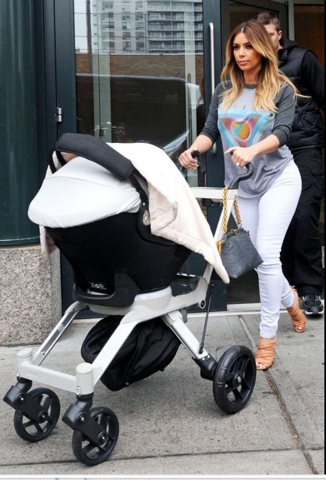 Kim out in NY with baby  North Post Baby Fashion, Kim Kardashian And North, Orbit Baby, Kardashian Dresses, Kim And Kanye, Kardashian Photos, Kim Kardashian Style, Travel Stroller, Post Baby