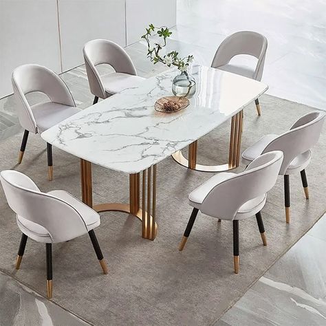 A dining table is the focal point of a dining room, workplace, or lounge, therefore, it should be more than just a place to dine. This faux marble dining table is firm, visually beautiful, fashionable, and a focal point of the space. Faux Marble Dining Table, Stainless Steel Dining Table, Dining Table Gold, Set Meja Makan, Gold Dining, Steel Dining Table, Table Marble, Marble Dining Table, Gray Dining Chairs