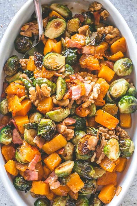 Maple Glazed Roasted Butternut Squash with Brussels Sprouts - A perfect side dish for your Holiday meals prepared with roasted Butternut Squash and Brussels Sprouts coated with a delicious maple glaze. #butternutsquash #brusselssprouts #sidedish #thanksgivingrecipes #thanksgiving #christmas #sidedishrecipes #vegetarian #glutenfree Turkey Dinner Sides, Butternut Squash And Brussels Sprouts, Thanksgiving Recipes Side Dishes Veggies, Turkey Side Dishes, Thanksgiving Side Dishes Easy, Thanksgiving Food Sides, Sprouts Recipe, Thanksgiving Recipes Side Dishes, Butternut Squash Recipes