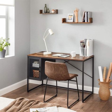 Create a stylish workspace with this industrial home office desk, complete with built-in storage. This wood and metal desk is constructed with high-grade steel with matte black coating, topped with laminated rustic brown particle board. It features a practical, built-in storage cabinet with height adjustable shelves. For ensured stability, this industrial home office desk has adjustable feet to suit any uneven surface. Steel Mesh Door, Dr Bedroom, Mesh Cabinet, Wood And Metal Desk, Industrial Style Desk, Industrial Home Offices, File Cabinet Desk, Desks For Small Spaces, Office Nook