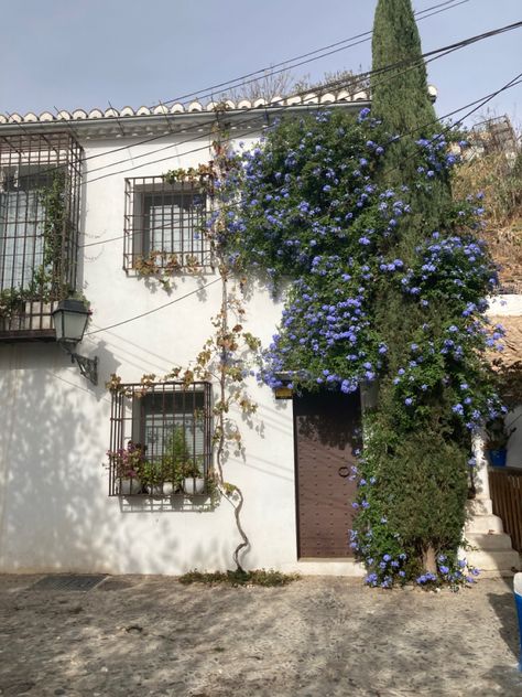 #spain #spanish #cutehouse #house #casa #whitehouse #summer #sun #aesthetic #flower #purpleflower Soft Spanish Aesthetic, Spanish Indie Aesthetic, Spain House Aesthetic, Spanish Core Aesthetic, Spanish Mountains, Houses In Spain, Summer Sun Aesthetic, Spanish Ceramics, Spanish Countryside