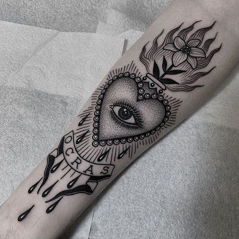 @black_casket sacred heart tattoo with eye and flower Sacred Heart Tattoo, E.t Tattoo, Sacred Heart Tattoos, Western Tattoos, Skeleton Hand Tattoo, Body Suit Tattoo, Eye Tattoo, Tattoo Blog, Old School Tattoo