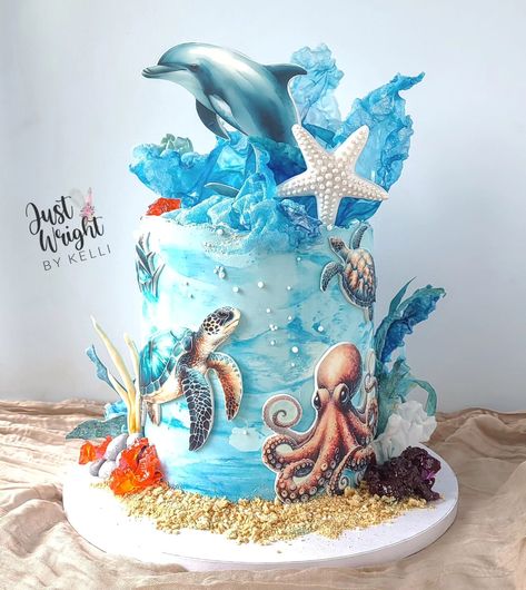 The beauty of the sea never escapes me! Beach/Ocean cakes and cookies are some of my favorite things to create. The imagery is stunning, never mind the textures you can create. I used a combination of waferpaper, rice paper, fondant, edible images, and isomalt to create this "Under the Sea" birthday cake. All the elements weren't extremely hard to create, but when put together, become a beautiful conversation piece. Happy birthday to my long-time customer, Savannah! I hope you like... Birthday Cake Fish, Under The Sea Birthday Cake, Sea Birthday Cake, Fish Cake Birthday, Things To Create, Ocean Cakes, Cakes And Cookies, Under The Sea Birthday, Sea Birthday