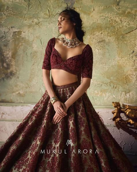 Ejaaz Couture on Instagram: "Mukul Arora Winter Festive 2022 is influenced by the rich European art and architecture merged with the Indian interpretation. The collection is pulsating with bursts of passion and verve, rich in textures, fierce in silhouettes and fresh in tonalities. The effervescent collection celebrates the heritage craftsmanship and expanding horizons for today’s bride and groom. 10 years of experience and experimentation to fulfil my dream, “Mukul Arora Couture“ Mukul Arora Mukul Arora Lehenga, Mukul Arora, He Never Cared, Ejaaz Couture, Best Indian Wedding Dresses, Bridesmaid Photoshoot, Latest Bridal Lehenga, Bride Dress Simple, Reception Lehenga