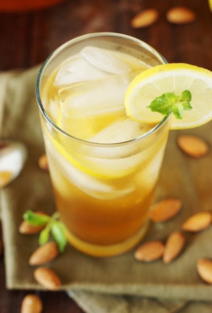 Almond Iced Tea ~ put a refreshing and flavorful twist on your sweet tea!   www.thekitchenismyplayground.com Almond Tea Punch Recipe, Almond Tea Recipe, Tea Punch Recipe, Iced Tea Punch, Almond Tea, Ninja Coffee, Almond Flavor, Lemon Tea, Flavored Drinks