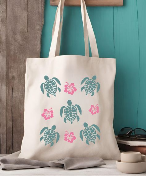 A classic cotton tote bag with sea turtles and hibiscus flowers!  This beachy tote bag is sure to please all the ocean animal lovers out there!  A fun conversation starter for every day use!  Sea Turtle Tote Bag, Hibiscus Bag Preppy Stuff Mermaidcore Coconut Girl Mermaid Core Mini Sea Turtle Gifts Seaturtle Cruise Accessories * Q U I C K * F A C T S * ✺ 100% cotton ✺ Bag size: 15"x 16" ✺ Heavy Cotton Fabric ✺ Handle Length: 20 inches (54.61cm) ✺ Open main compartment ✺ Colors may vary due to com Hibiscus Flower Tote Bag, Cruise Accessories, Ocean Tote Bag, Turtle Stuff, Handpainted Tote Bags, Sea Turtle Gifts, Mermaid Core, Bebidas Do Starbucks, Turtle Gifts