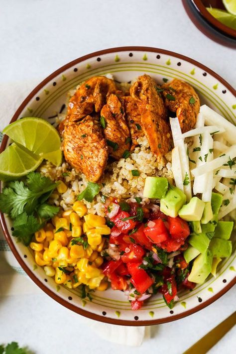 This quick and easy 30-minute chili lime chicken bowl recipe incorporates quinoa, brown rice, chili lime chicken, jicama, corn, pico de gallo, avocado, cilantro, lime and hot sauce to create the ultimate weeknight dinner recipe meets healthy lunch idea.#healthylunchideas #easylunchideas #weeknightdinners #weeknightdinnerrecipes #chickenrecipes #fastchickenrecipes Healthy Chicken Bowls, Healthy Burrito Bowl, Grain Bowl Recipe, Chili Lime Chicken, Chicken Bowl Recipe, Chicken Bowls, Make Ahead Lunches, Chicken Bowl, Prepped Lunches