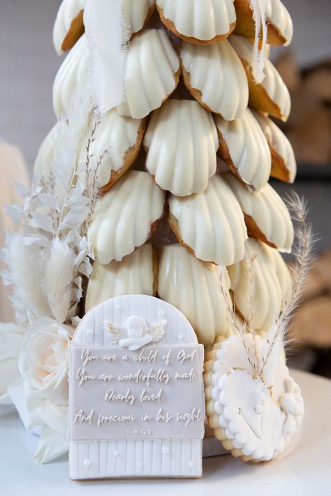 Callebaut white chocolate madeleine tower and custom fondant cookies for a boho baptism. Check us out on Instagram! Christmas Madeleines, Madeleine Tower, Cake Pop Tree, Macaroon Tree, Boho Baptism, Solstice Party, Fourth Of July Cakes, Custom Sugar Cookies, Madeleine Cookie