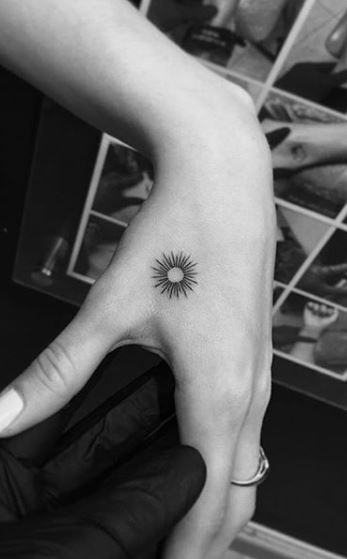 <<Check out the tattoos  #tattoomenow #tattooideas #tattoodesigns #micro #tiny #small #hand Tiny Sunflower Tattoo Simple Finger, Micro Tattoo Placement Ideas, Sunshine Tattoo Wrist, Tiny Boho Tattoos, Sunshine Hand Tattoo, Micro Hand Tattoo, Miniature Tattoos For Women, Micro Sun Tattoo, Sun Tattoo On Hand