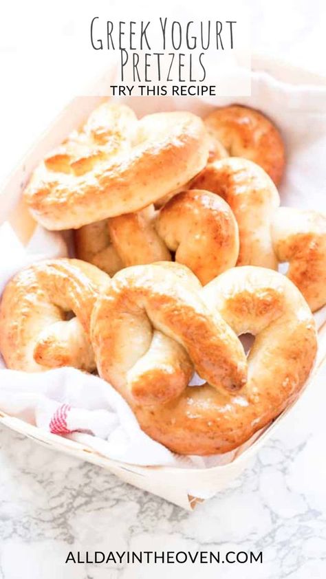 Pretzels on a baking tray or stacked in a basket Healthy Pretzels, Make Pretzels, Greek Yogurt Bread, How To Make Pretzels, Easy Oven Recipes, 2 Ingredient Dough, Yogurt Pretzels, Yogurt Bread, Baked Pretzels