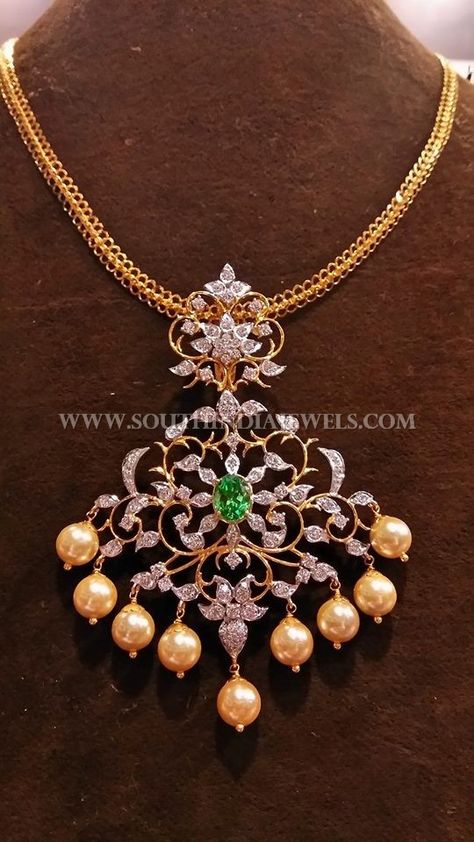 Gold short chain with gorgeous diamond pendant adorned with bold pearls. For inquiries please contact the seller below. Seller Name : Jewels Indian Antique Contact : +91 80 4125 2333, 9980965091 Email : jewelsindiaantiqueshoppee@gmail.com Related PostsNakshi Work Diamond Temple PendantDiamond Pendant Set With PearlsGold Chain With Diamond Ruby PendantDesigner Diamond Pendant Set From Rakesh JewellersDiamond … 14k Rose Gold Jewelry, Diamond Pendant Jewelry, Diamond Pendants Designs, Gold Jewelry Simple Necklace, Beautiful Gold Necklaces, Gold Necklace Indian Bridal Jewelry, Beaded Necklace Designs, Gold Jewelry Stores, Antique Jewelry Indian