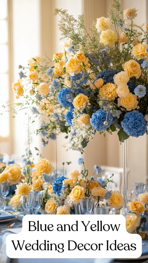 Elegant blue and yellow wedding decor featuring floral arrangements and table settings, creating a bright and stylish atmosphere for a memorable celebration. Yellow Spring Wedding Theme, Light Blue And Yellow Wedding Cake, Dusty Blue And Pale Yellow Wedding Theme, Blue And Yellow Tablescapes, Light Blue And Yellow Wedding Theme, Dusty Blue And Yellow Wedding Theme, Blue And Yellow Flower Arrangements, Yellow And Blue Wedding Flowers, Yellow And Blue Wedding Theme