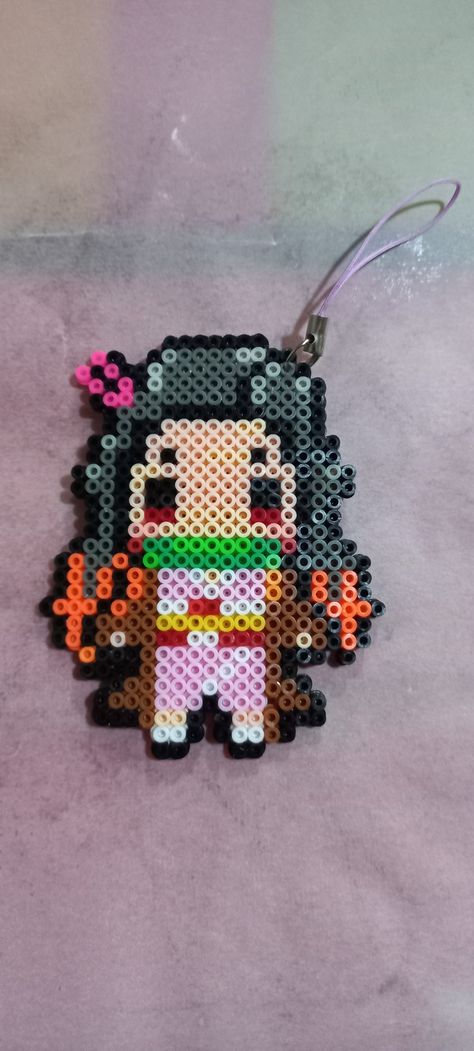 Nezuko hama beads Nezuko Perler Beads, Hama Beads Anime, Pixel Aesthetic, Art Perle, Perler Bead Templates, Hama Bead, Beads Designs, Kandi Patterns, Oc Gacha