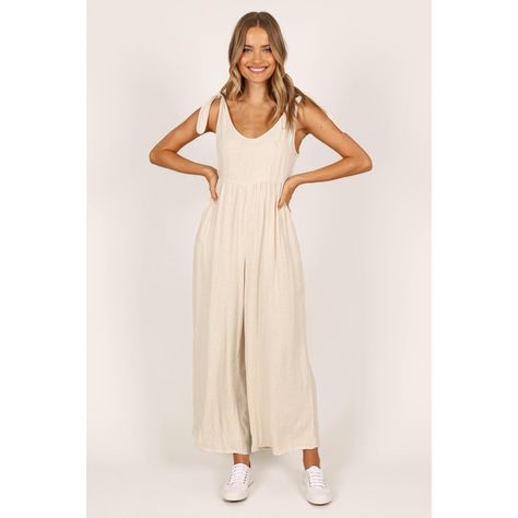 Step up your casual look this season with a linen wide leg jumpsuit. Cut in an easy-to-wear pull on design, it features tie close shoulder straps and an elasticized waist band to create the perfect fit, while functional pockets add practicality. Petal And Pup, Style Jumpsuit, Short Loungewear, Exclusive Clothing, Linen Jumpsuit, Strapless Tops, Dresses By Length, On Design, Wide Leg Jumpsuit