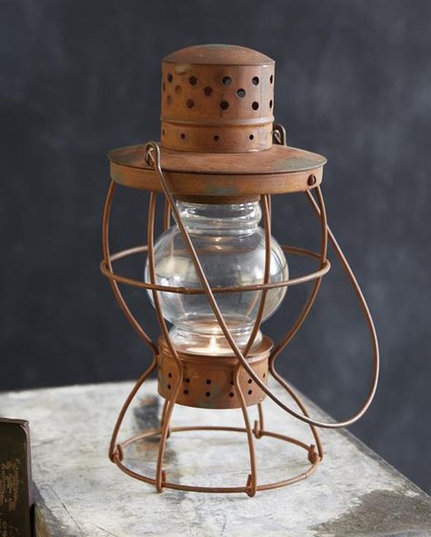 Bring your vintage style outdoors! Adding lanterns and lamps is the perfect way to add a cozy touch to your covered porch in the warmer months. Railroad Lanterns, Tea Light Lanterns, Blue Ridge Mountain, Blue Lantern, Lantern Centerpieces, The Lantern, Metal Lanterns, Antique Inspiration, Antique Farmhouse