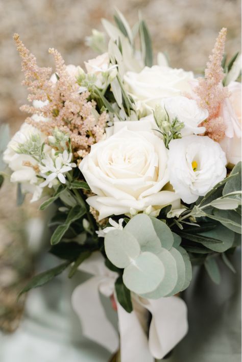 Wedding in Tuscany details: Bucolic bridal bouquet realised with eucalyptus and olive brunches, with white lisianthus, white roses and a touch of blush mix of flowers. 
The bouquet is closed with a white silk ribbon. Bridal Bouquet Italy, Bridal Bouquet Eucalyptus Blush Pink, Tuscany Wedding Bouquet, Blush And Olive Wedding, Courtyard Flowers, Chic Bridal Bouquet, Champagne Wedding Flowers, Natural Bridal Bouquet, Italian Courtyard