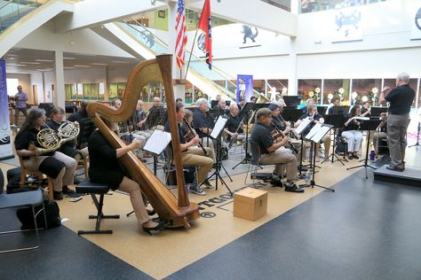 Clarksville, TN - The Cumberland Winds Concert Band recently returned to the Clarksville-Montgomery County Public Library to perform a program that included marches, film scores, folk melodies and period music. One of this year's highlights was CJ Puentes on tuba performing “Tuba Tiger Rag” as played by the Canadian Brass. The event, which is always free and open to the public, drew a nice crowd to the library's atrium. Cumberland Winds promotes quality musical performances with a wide vari... Band Playing, Film Score, Clarksville Tn, Concert Band, A Program, Montgomery County, Private Event, Public Library, Master Class